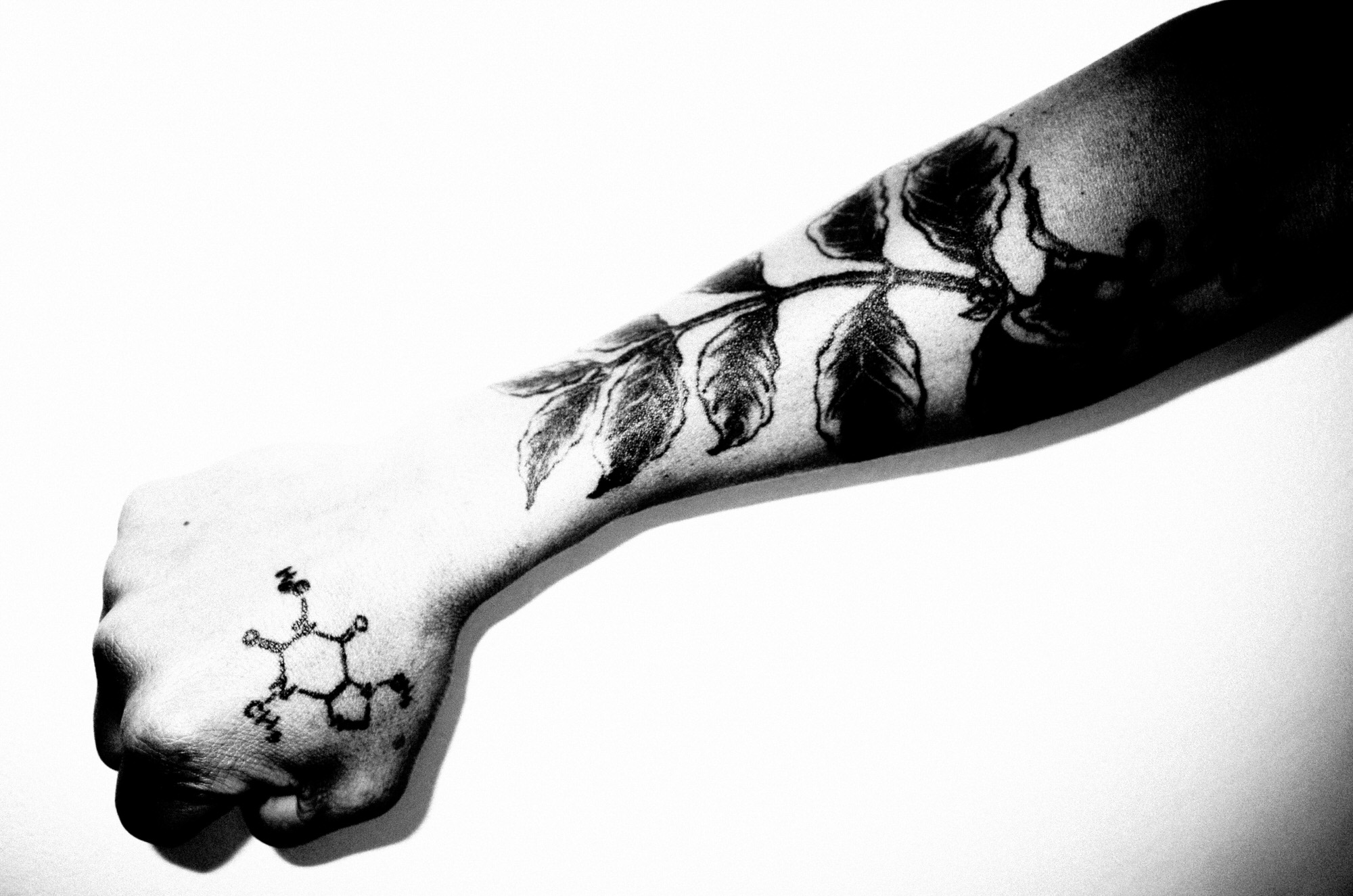 eric kim tattoo black and white coffee arm