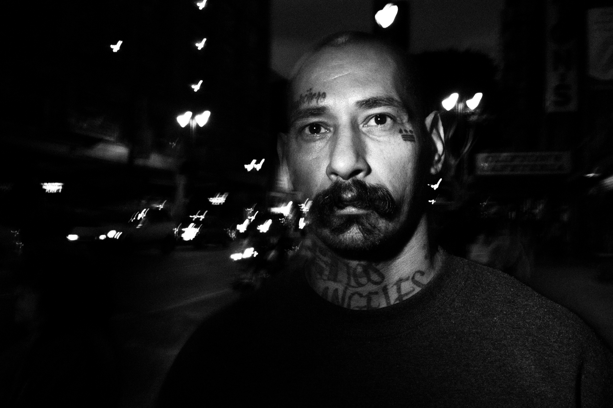 eric kim street photography - the city of angels - black and white-4-street-portrait-hearts-tattoo-downtown-la