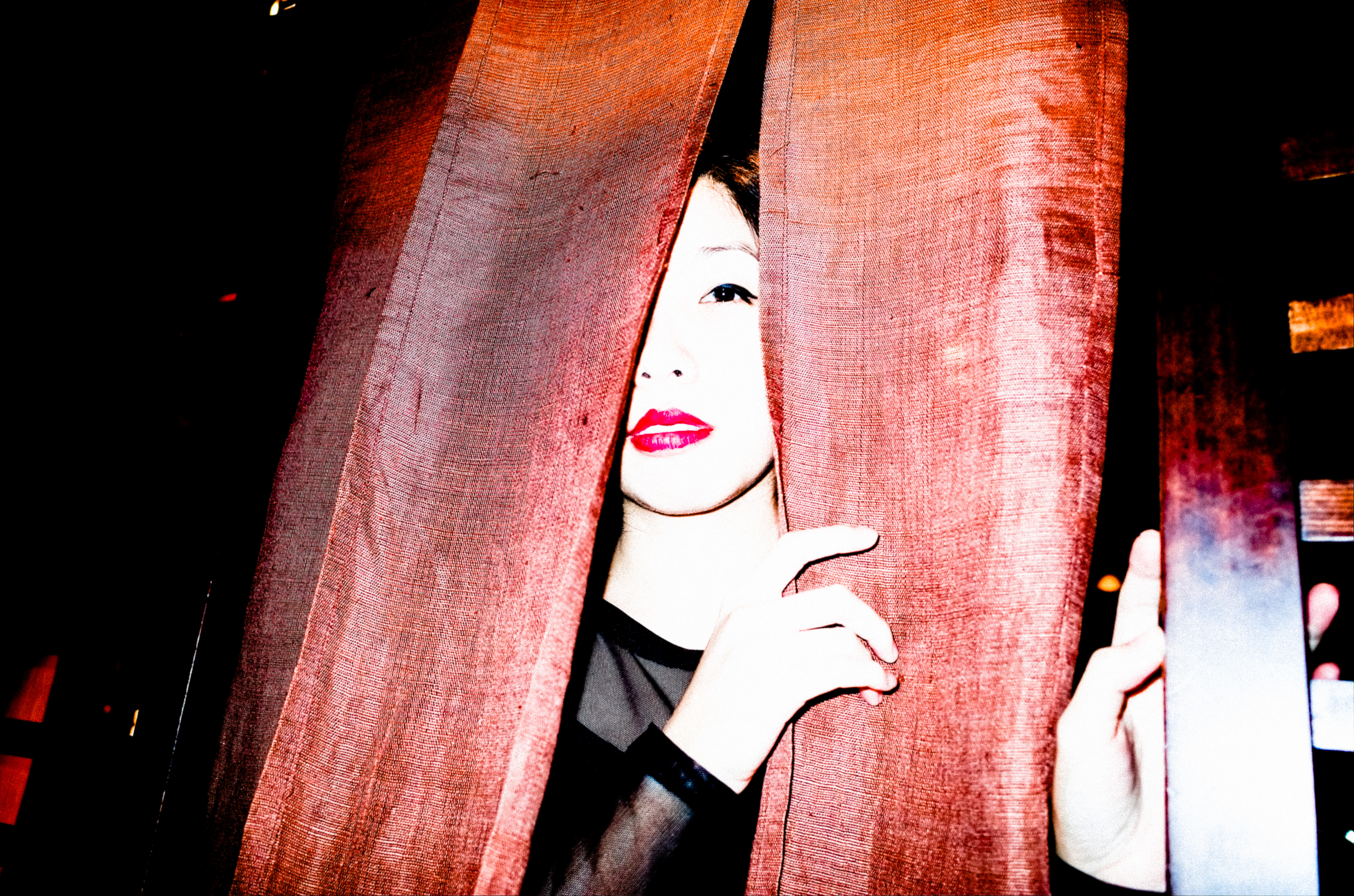 Cindy peeking through the curtain. Kyoto, 2017