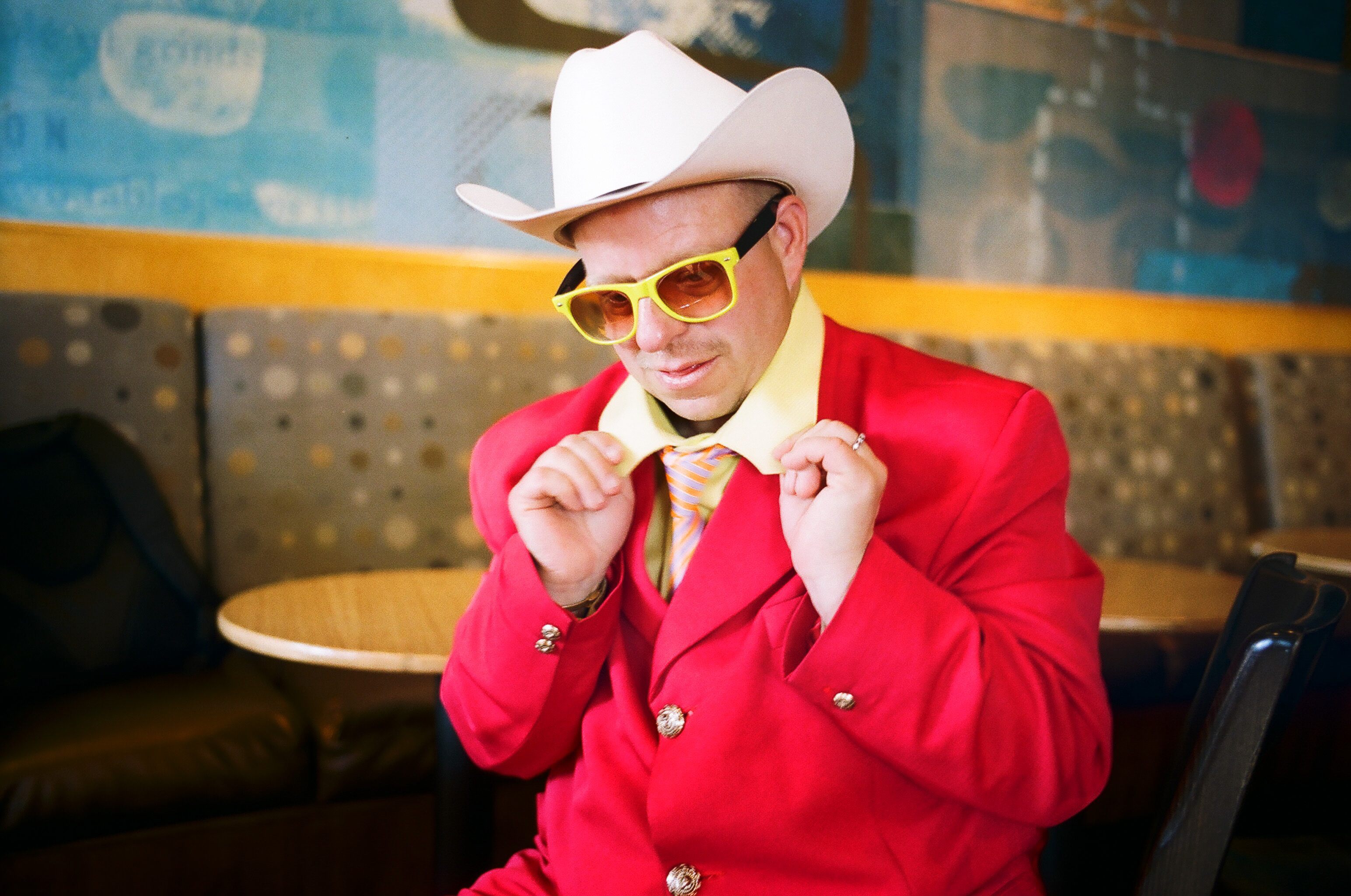 Red cowboy. Red, yellow, blue. Los Angeles, 2013. Street photograph by Eric Kim.