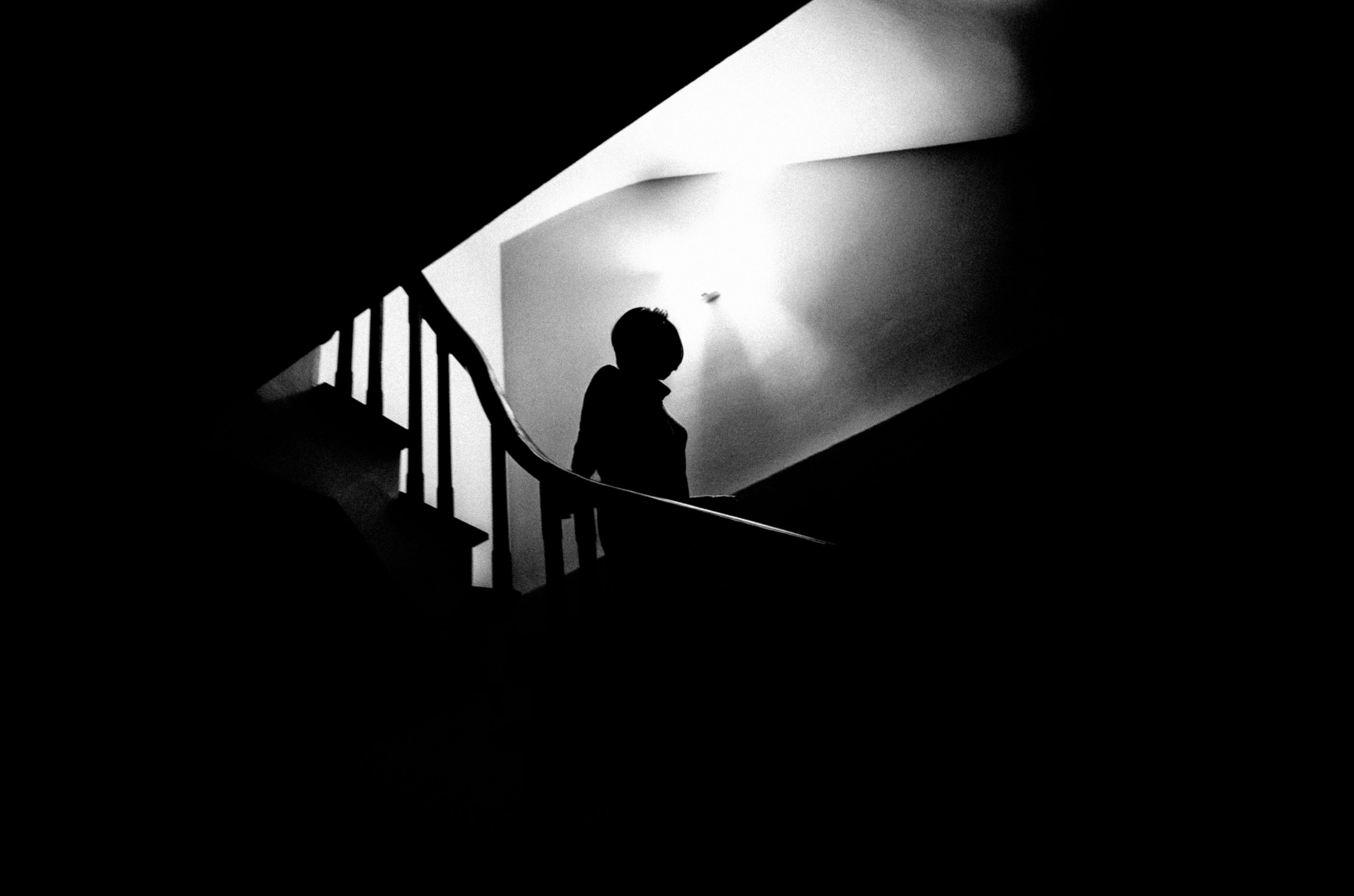 Figure to ground example: Silhouette of Cindy against backlight of stairwell. Hanoi, 2017