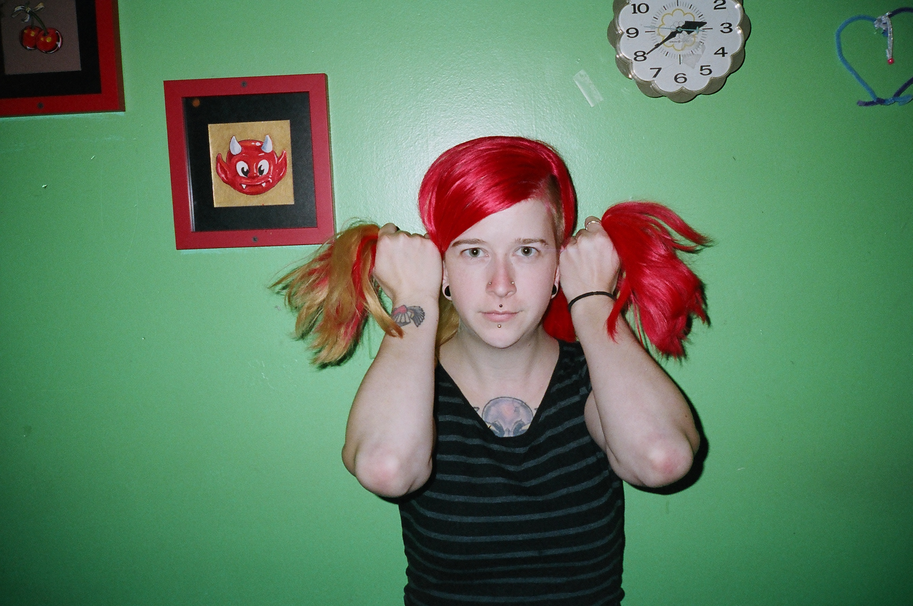 Girl with red pigtails. Philadelphia, 2013