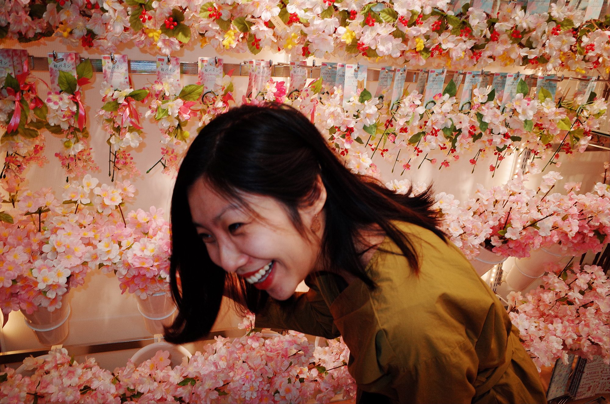 Cindy laughing inside Daiso. Osaka