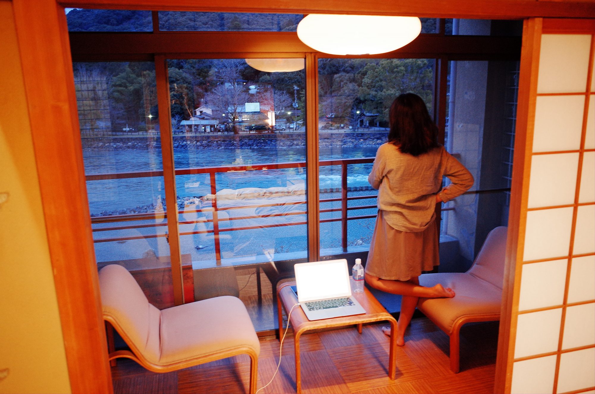 Cindy inside our Ryokan, looking out towards the water.