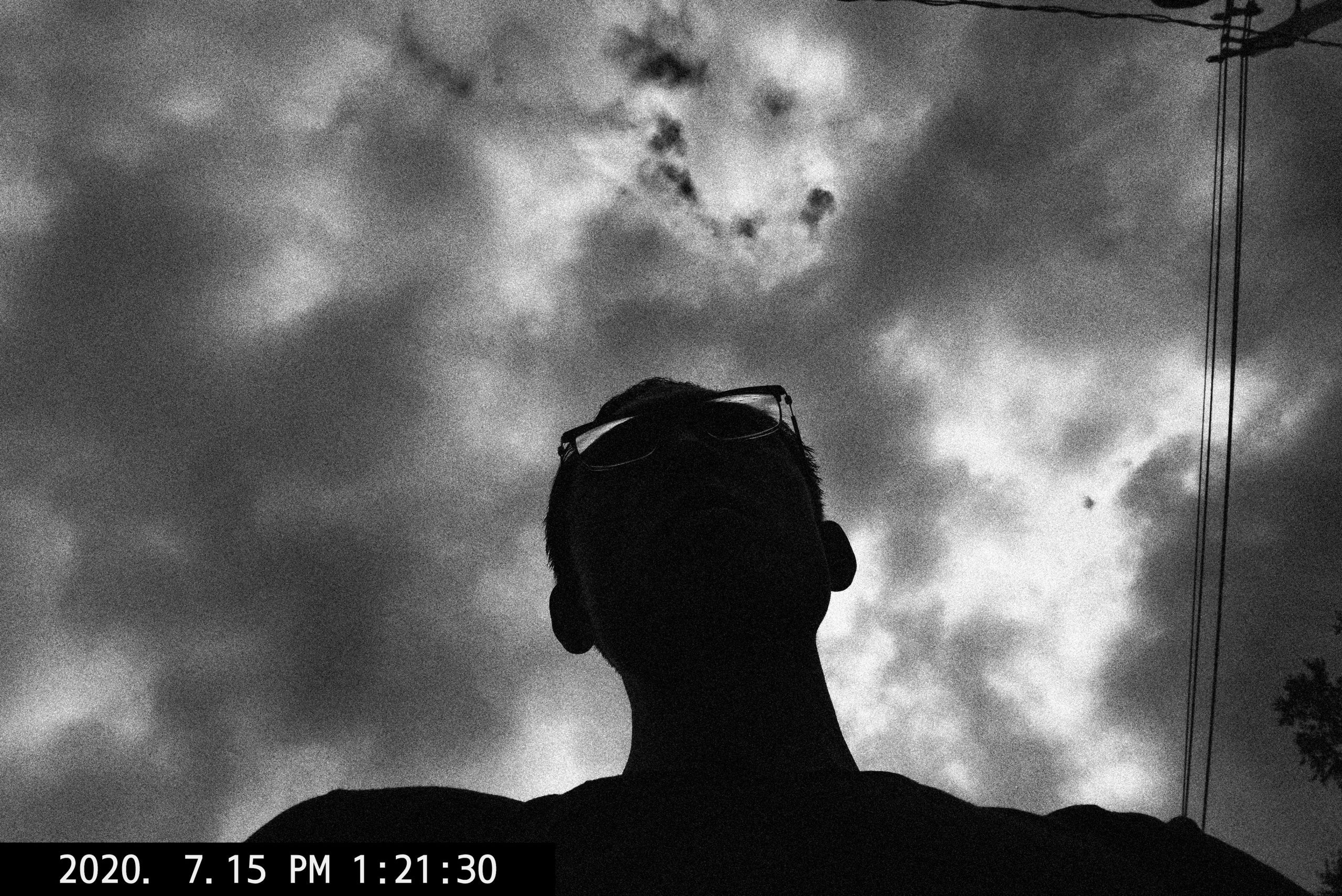 selfie black and white ERIC KIM clouds
