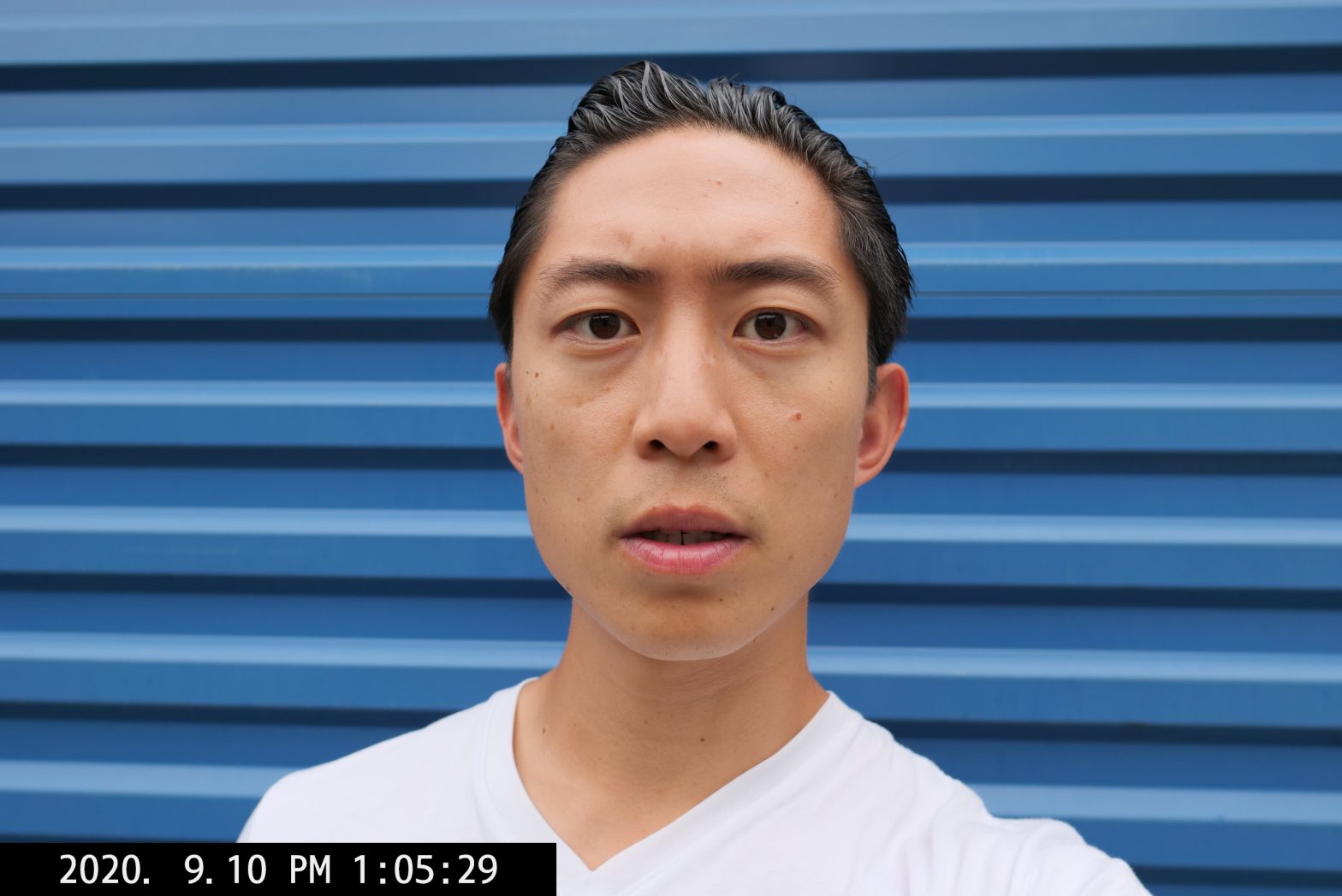 selfie ERIC KIM orange blue